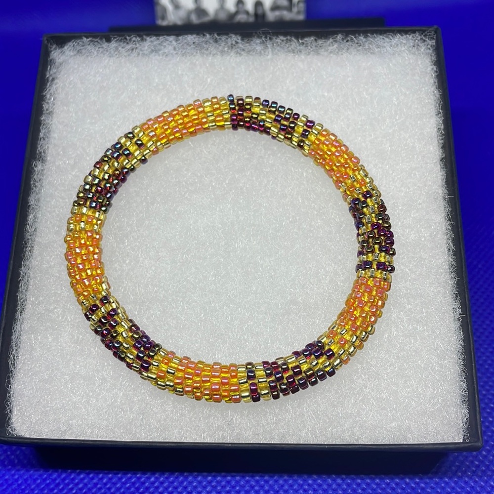 Sashka multi color stretch bracelet with box.